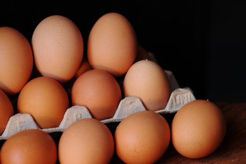 close up egg on wood wood background and space