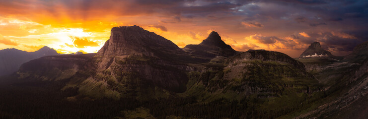 Beautiful Panoramic View of American Rocky Mountains during Cloudy Summer Sunset or Sunrise....
