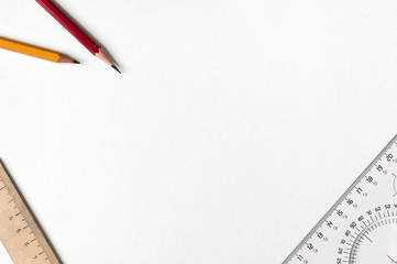 ruler and pencil on white paper