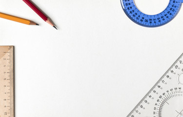 pencil and ruler on a white background
