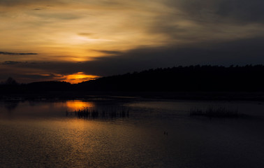 Fototapeta na wymiar Evening Lake on Sunset in Ukraine
