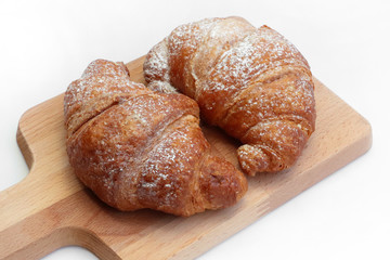 croissant on a wooden table