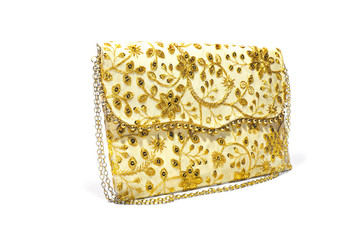 golden purse for bride on white
