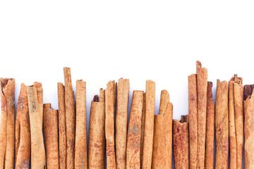 cinnamon on white background.