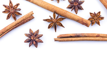 cinnamon and star anise on white background.