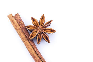 cinnamon and star anise on white background.