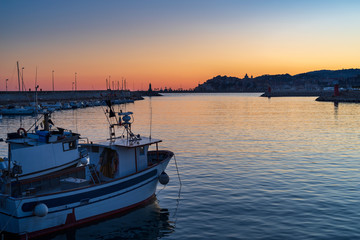 Fototapeta premium Sunset over the harbour, Imperia, Liguria region, Italy