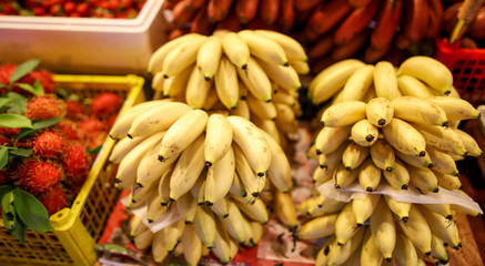 Bananas on the counter in the market.