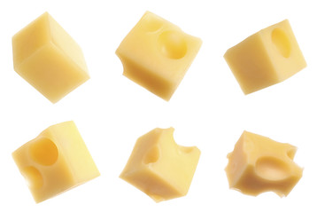 Set of delicious cheese cubes on white background
