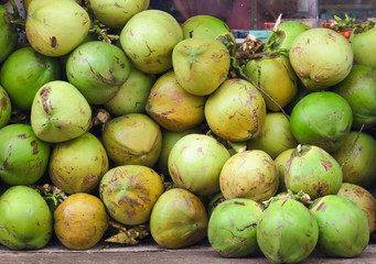 Fresh coconuts on the market.