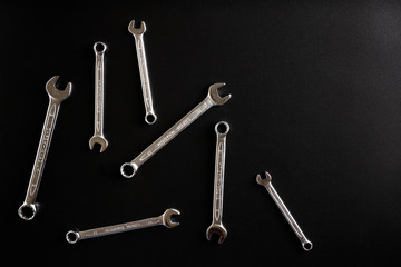 Spanners. Black isolated background. Iron tools.