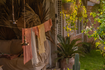 authentic house, villa in rural Balinese, with natural decor, in the form of drying fabrics on the terrace