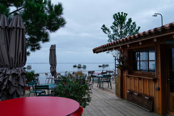 wooden terrace at seaside winter morning in village of Cap Ferret in Bassin Arcachon France