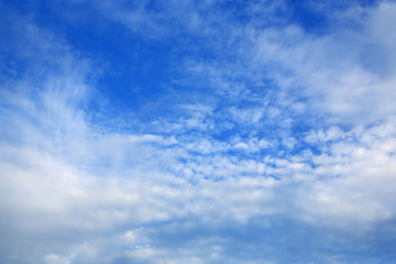 Naklejka na ściany i meble Abstract fluffy clouds on the blue sky background.