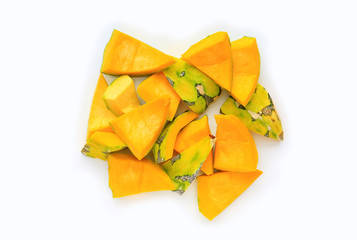 Pieces of sliced pumpkin isolated on white background
