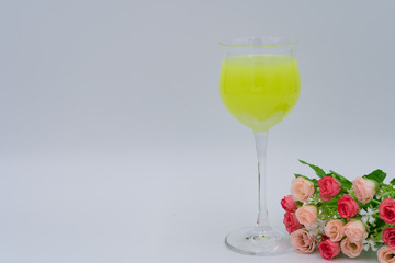 写真素材: メロンソーダと花