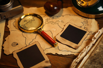 Composition with vintage detective items on wooden table, closeup