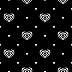 Seamless pattern. Striped black-white and white hearts on black background. Vector illustration. Ideas for holiday designs, backgrounds, greeting cards, holiday prints, designer packaging, textile.