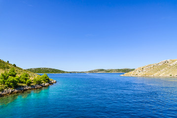 Fototapeta na wymiar Croatian coast, scenic view. Mediterranean landscape with sea and islands. Croatia, vacation travel concept.
