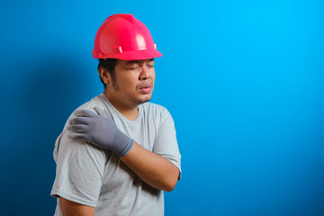 Fat Asian guy wearing a red helmet