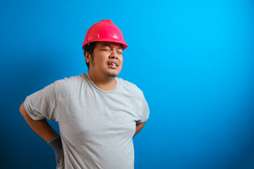 Fat Asian guy wearing a red helmet