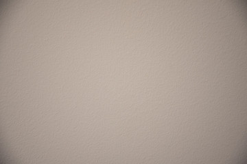 cream wall texture background. Close-up, pastel colors.