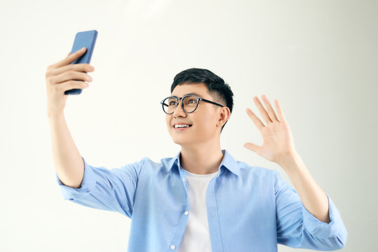 Young man looking at his smartphone