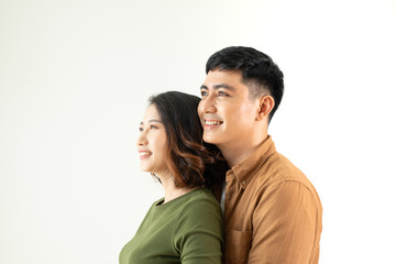 Obraz premium Beautiful young happy couple love smiling embracing