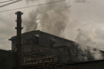 The smoke from the furnaces to the steel plant