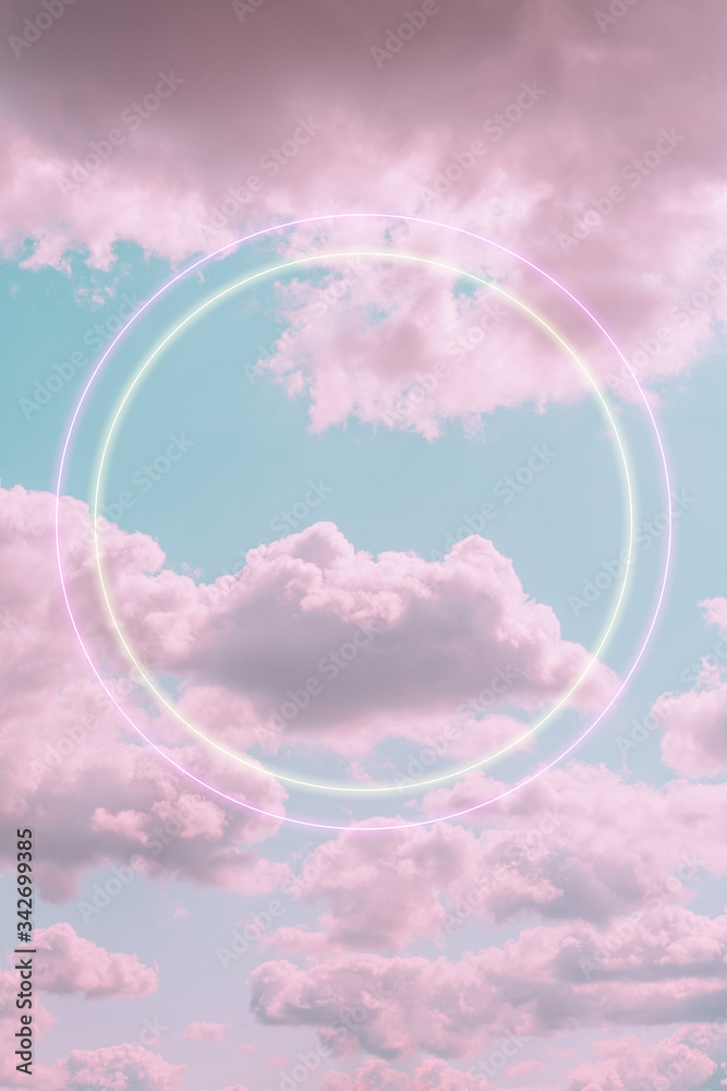 Wall mural Aesthetic art collage with beautiful turquoise sky with pink clouds and two circle light frames. Angel paradise concept