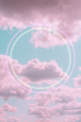 Aesthetic art collage with beautiful turquoise sky with pink clouds and two circle light frames....