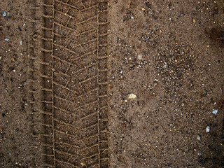 Tire tread mark on the ground. The concept of adventure and discovery, off-road driving.          