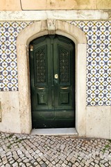 Old and colorful wooden door with iron details
