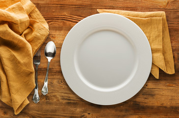 empty plate on wooden background