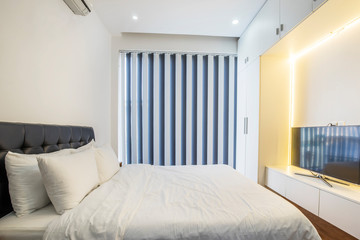 Bright and cozy modern bedroom at Ho Chi Minh city, Vietnam
