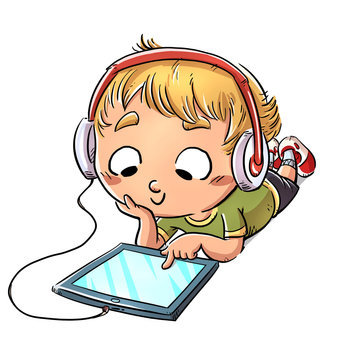 boy lying with headphones and tablet