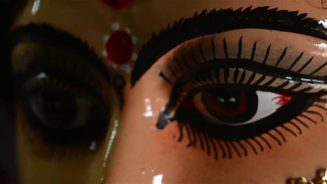 Close up Portrait of Durga Maa with a third eye or "TriNayani". A symbol of strength and power. Captured from a famous potter studio in Kumartuli, Calcutta Kolkata, West Bengal, India South Asia Pac