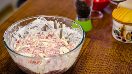 Cooking Meat. Onions And Tomatoes Dance Around The Frying Pan, Then A Plate Of Sliced Meat Appears In The Picture.