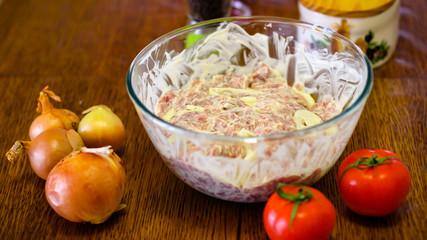 Cooking Meat. Onions And Tomatoes Dance Around The Frying Pan, Then A Plate Of Sliced Meat Appears In The Picture.