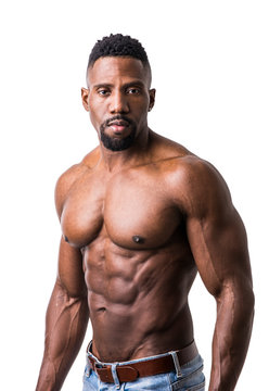 African American bodybuilder man, naked muscular torso, wearing jeans, isolated on white background