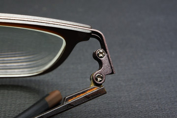 Eyeglasses hinge with black background