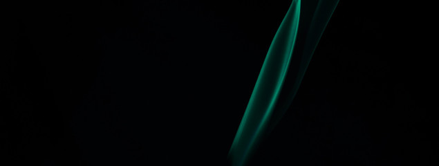 Green smoke on black background