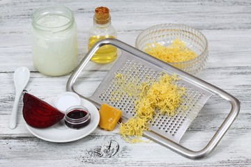 Homemade lip balm made from beeswax and  olive with coconut oil. Red beet is used due to attractive color.  Alternative cosmetic product without harmful ingredients.