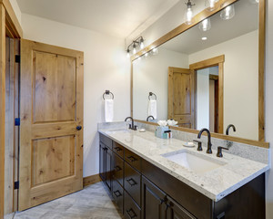Natural new classic bathroom interior with new glass and ceramic tiles walk in tub for shower
