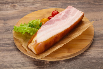 Smoked pork breast with salad leaves