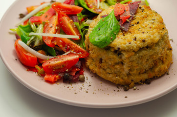 Smoked haddock fishcake with melting cheddar sauce and mixed salad