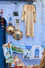 Souvenirs sale on streets of kasbah - old part of city Chefchaouen, Morocco.