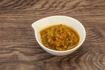 Green spicy sauce in the bowl