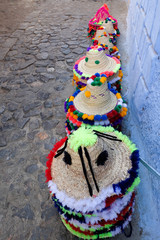 Traditional hats in Maghreb style for sale in Chefchaouen town in Morocco.