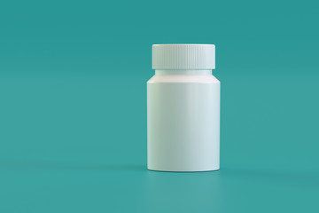 Plastic bottle for pills on a green background.